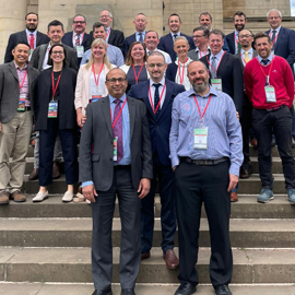 A portrait of all the speakers at the Kids Knee Conference, on the steps of the Sheffield City Hall.
